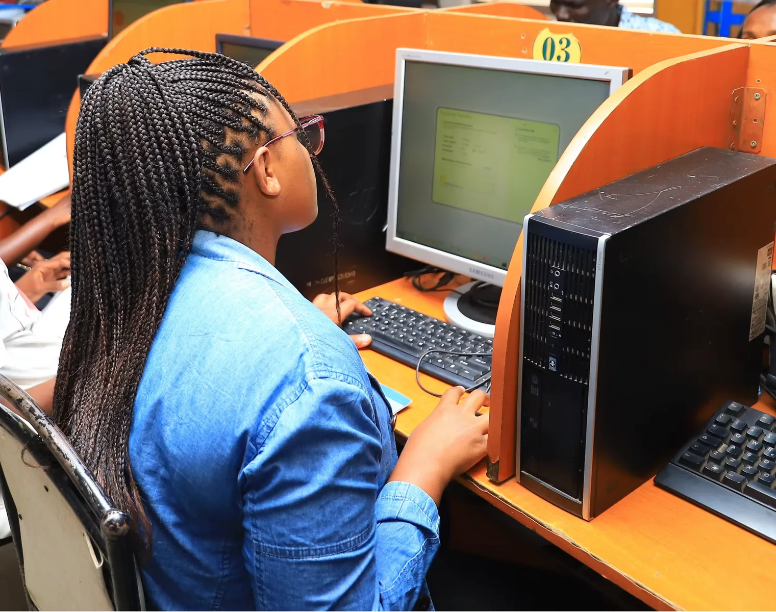 Students in a computer lab during practical technical training at ICS Technical College.